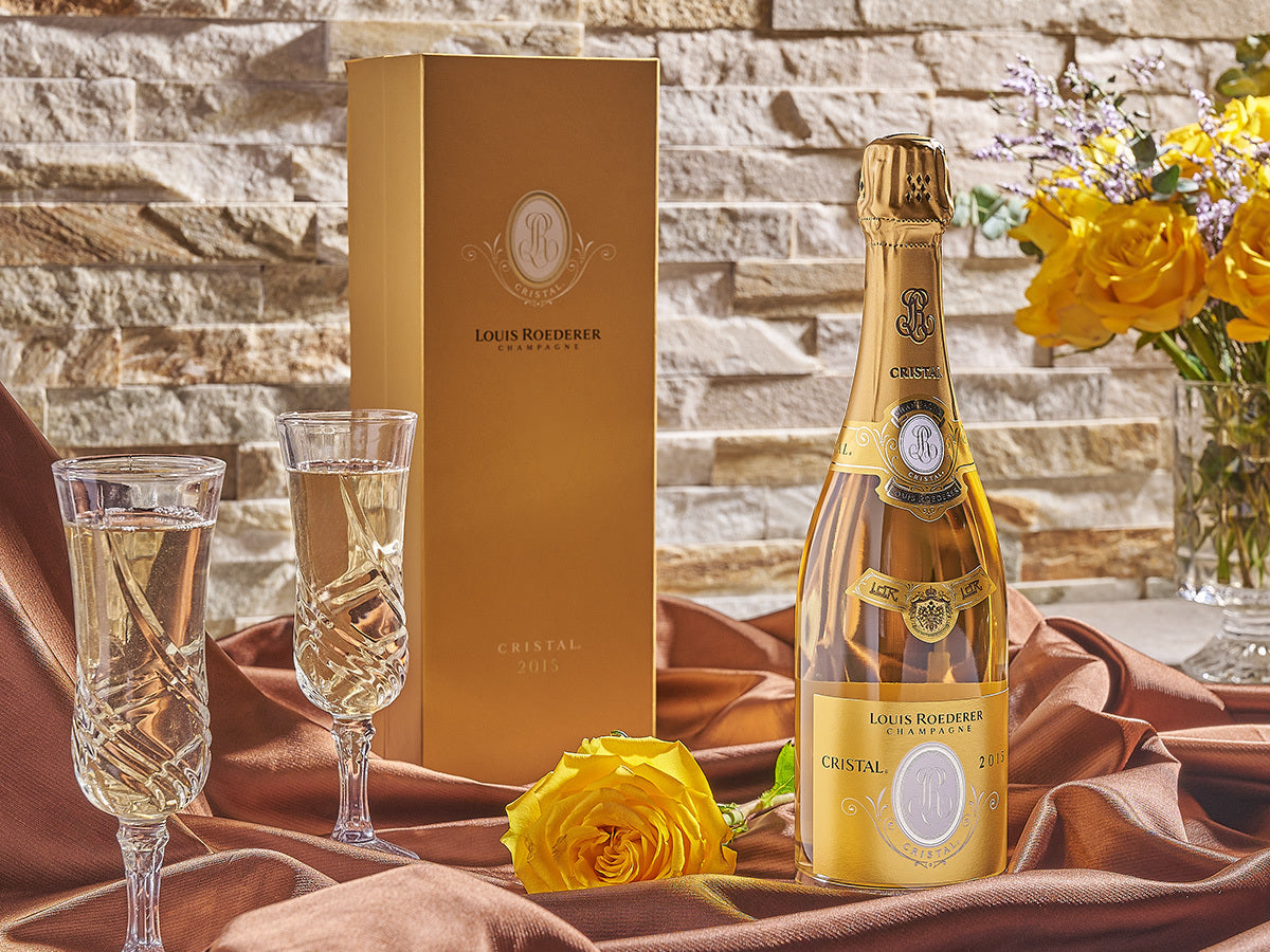 Close-up of luxury gift basket with champagne and gourmet items